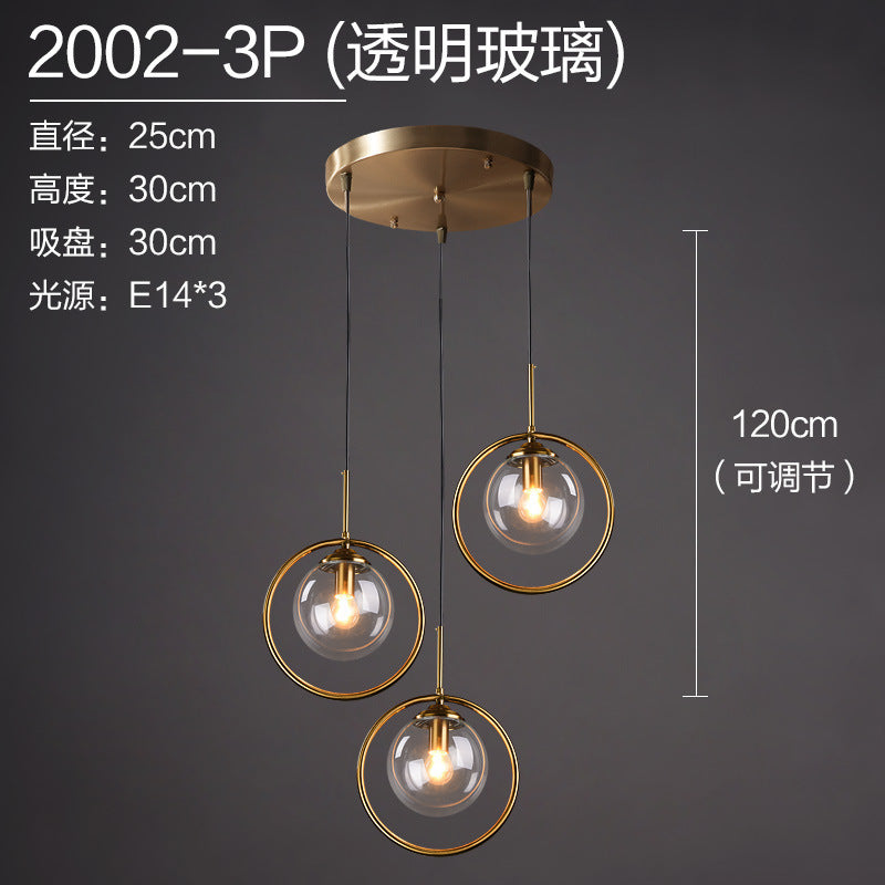 Modern brass pendant light with 3 clear glass globes, adjustable height, E14 bulbs, contemporary home decor