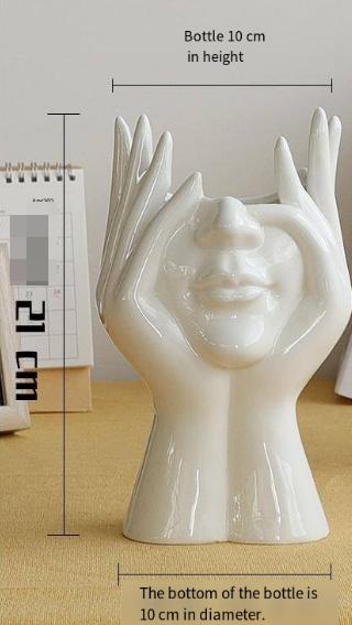 White ceramic face sculpture with hands, modern home decor, 21 cm height, 10 cm diameter base